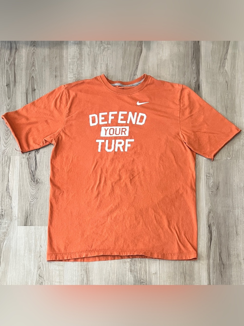Nike Men’s Orange Short-Sleeve 'Defend Your Turf' Graphic Tee